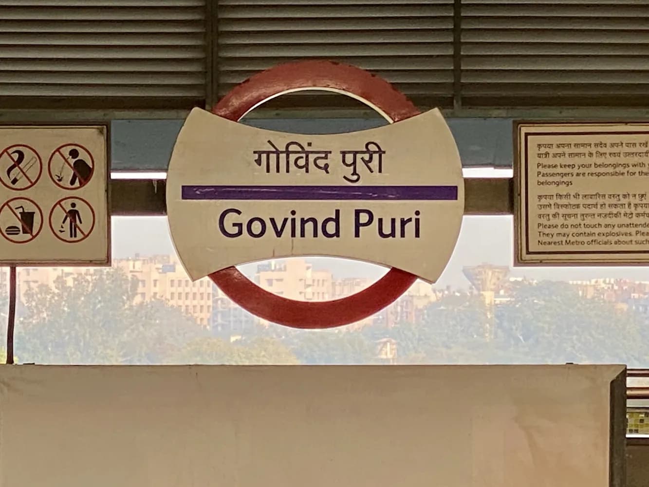 Bilingual station sign at Govind Puri Metro Station
