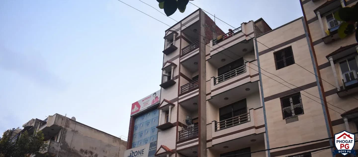 Upper exterior view of the building containing Phogat PG in Govindpuri